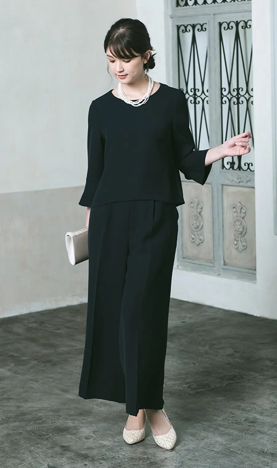カジュアルテイストなセットアップパンツスーツの着用画像